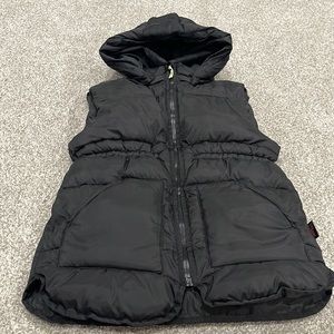 H&M Long Puffer Vest Size 8-10. Gently used. In good conditions